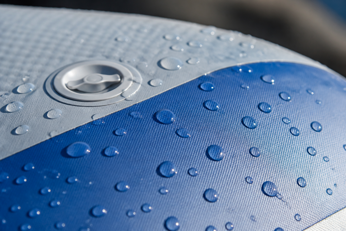 Water-resistant inflatable material detail in a factory setting