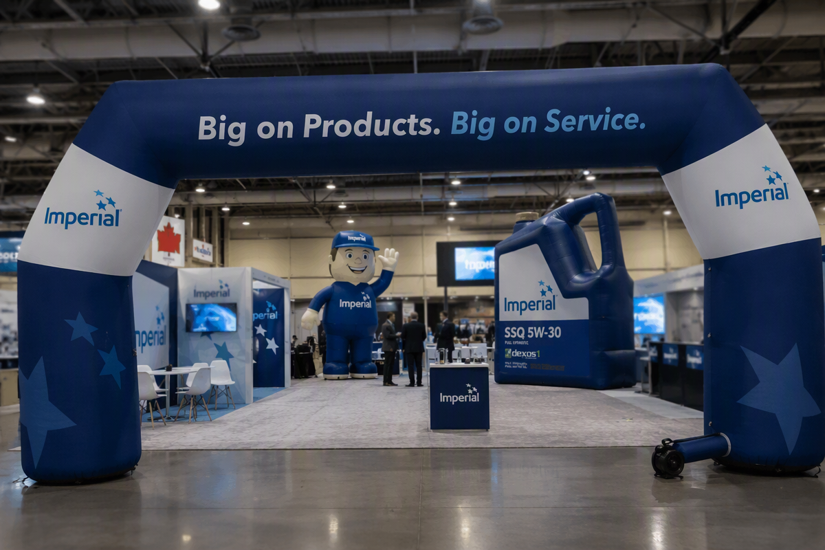 Custom inflatable displays arranged for a trade show booth in an exhibition hall