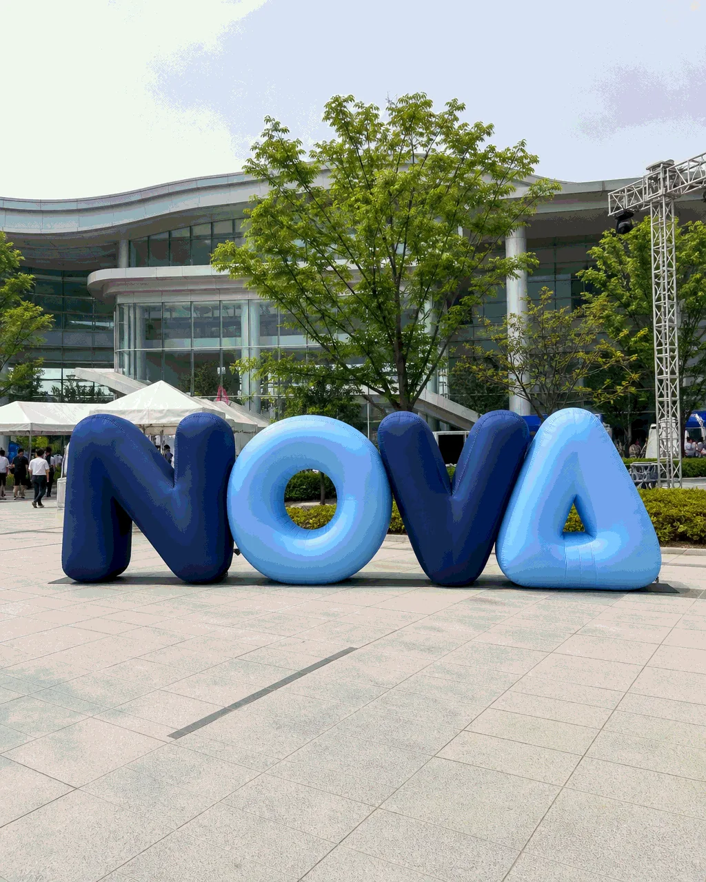 Custom inflatable logo sign at a branded event installation